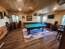 Buffalo Lodge has a game room with pool, shuffleboard, and board games